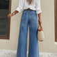 High-Waist-Jeans mit weitem Bein und Knopfdetail