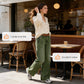 High-Waist-Jeans mit weitem Bein und Knopfdetail